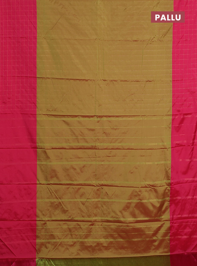 Arani semi silk saree dual shade of green and pink with allover copper zari weaves and zari checked border