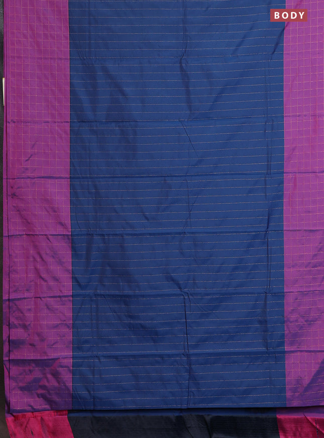 Arani semi silk saree blue and purple with allover copper zari weaves and zari checked border