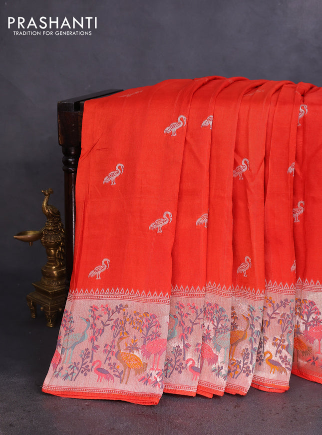 Banarasi raw silk saree orange with silver zari woven buttas and silver zari woven paithani style border