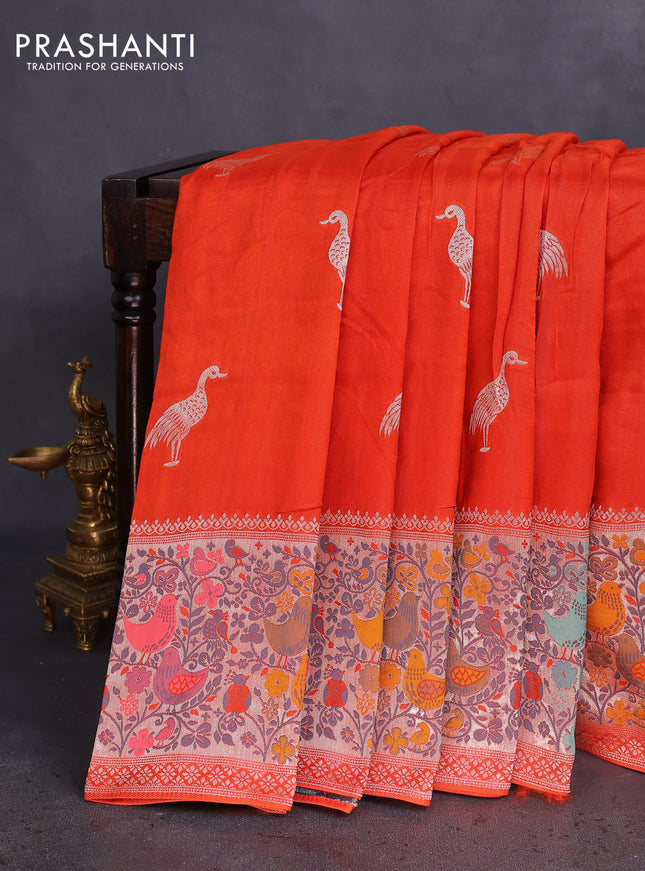 Banarasi raw silk saree orange with silver zari woven buttas and silver zari woven paithani style border