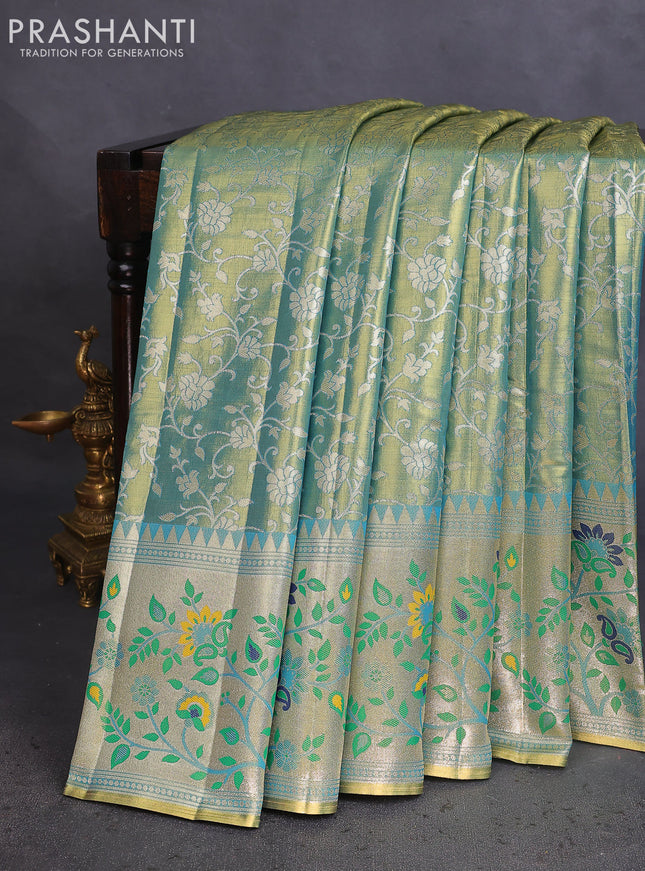 Tissue paithani saree dual shade of teal blue with allover floral zari weaves and zari woven paithani style border