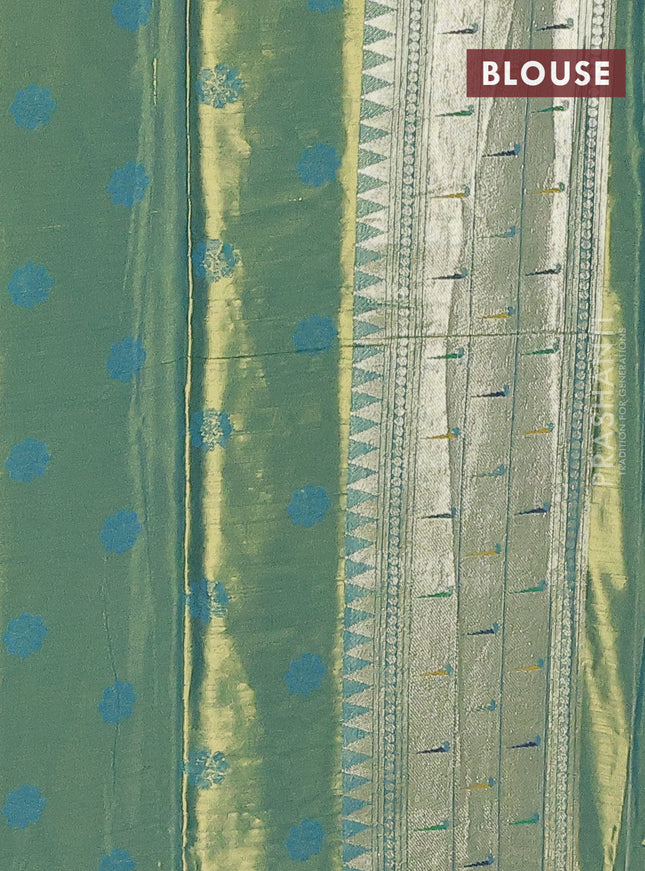 Tissue paithani saree dual shade of teal blue with allover floral zari weaves and zari woven paithani style border