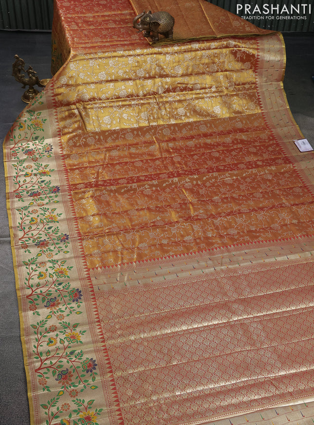 Tissue paithani saree dual shade of reddish gold with allover floral zari weaves and zari woven paithani style border