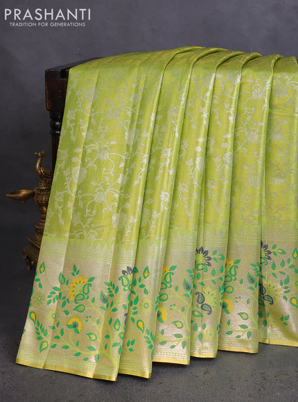 Tissue paithani saree light green with allover floral zari weaves and zari woven paithani style border