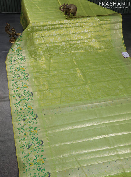 Tissue paithani saree light green with allover floral zari weaves and zari woven paithani style border