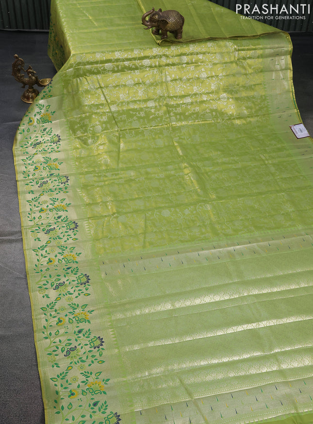 Tissue paithani saree light green with allover floral zari weaves and zari woven paithani style border