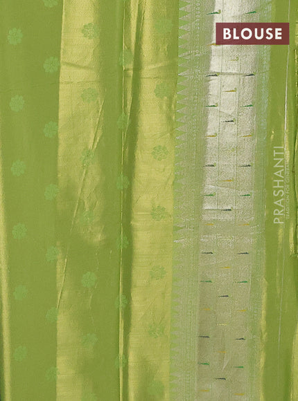 Tissue paithani saree light green with allover floral zari weaves and zari woven paithani style border