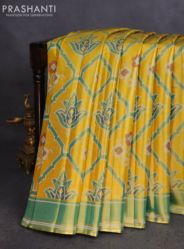 Tissue paithani saree yellow and teal green with allover ikat thread weaves and rettapet border