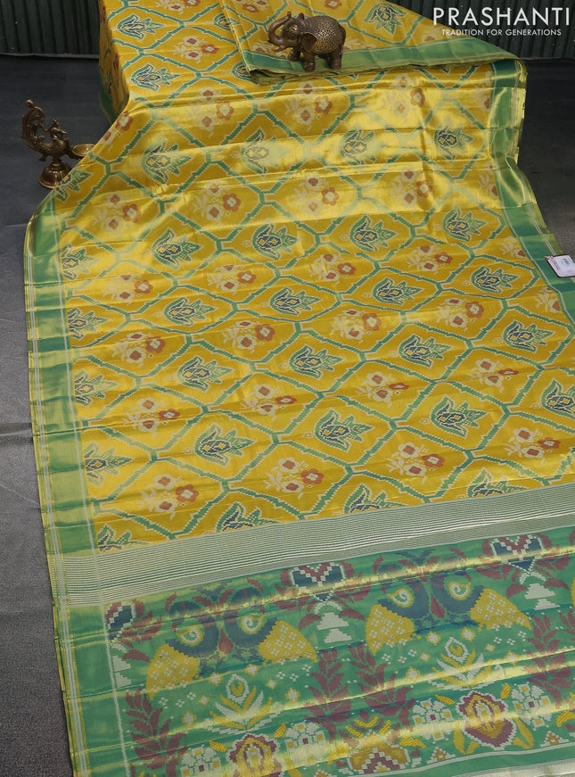 Tissue paithani saree yellow and teal green with allover ikat thread weaves and rettapet border