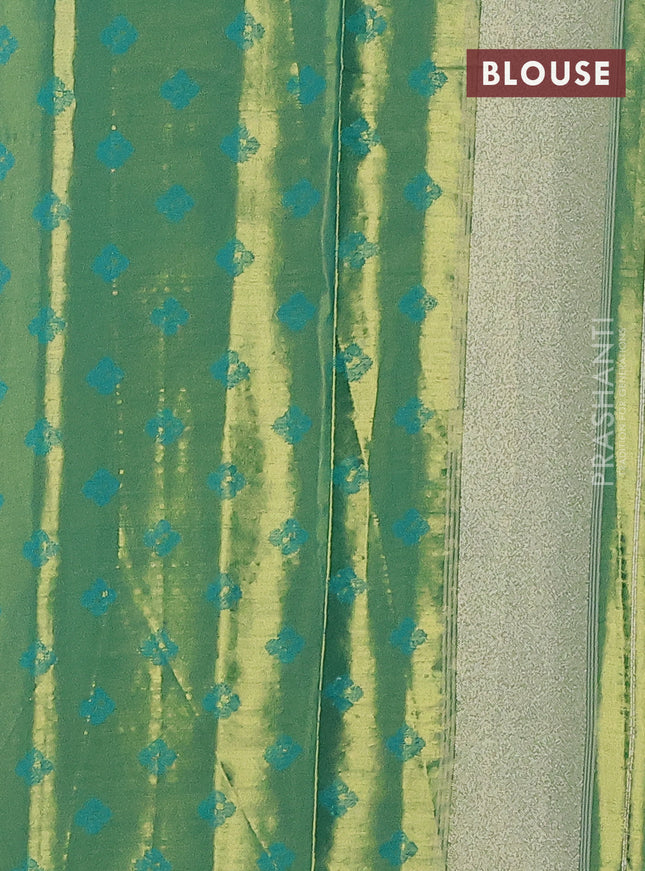 Tissue paithani saree yellow and teal green with allover ikat thread weaves and rettapet border