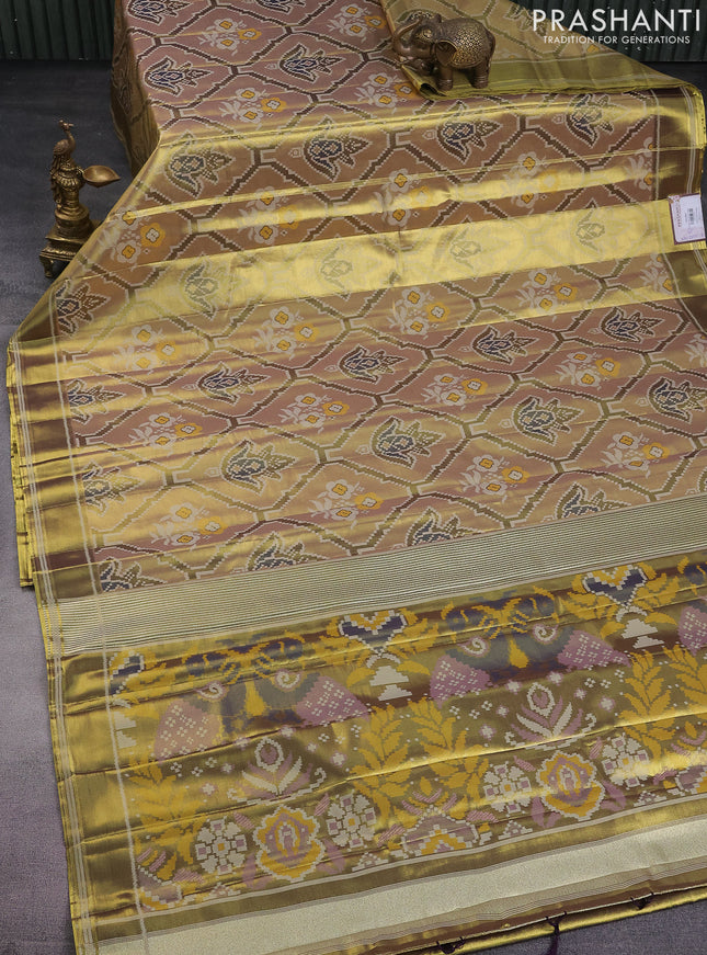 Tissue paithani saree dual shade of gold and mehendi green with allover ikat thread weaves and rettapet border
