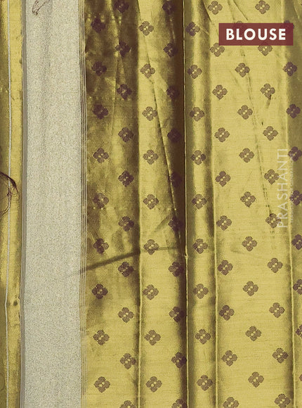Tissue paithani saree dual shade of gold and mehendi green with allover ikat thread weaves and rettapet border
