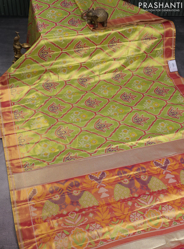 Tissue paithani saree light green and pink with allover ikat thread weaves and rettapet border