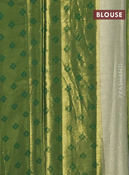 Tissue paithani saree dual shade of gold and green with allover ikat thread weaves and rettapet border
