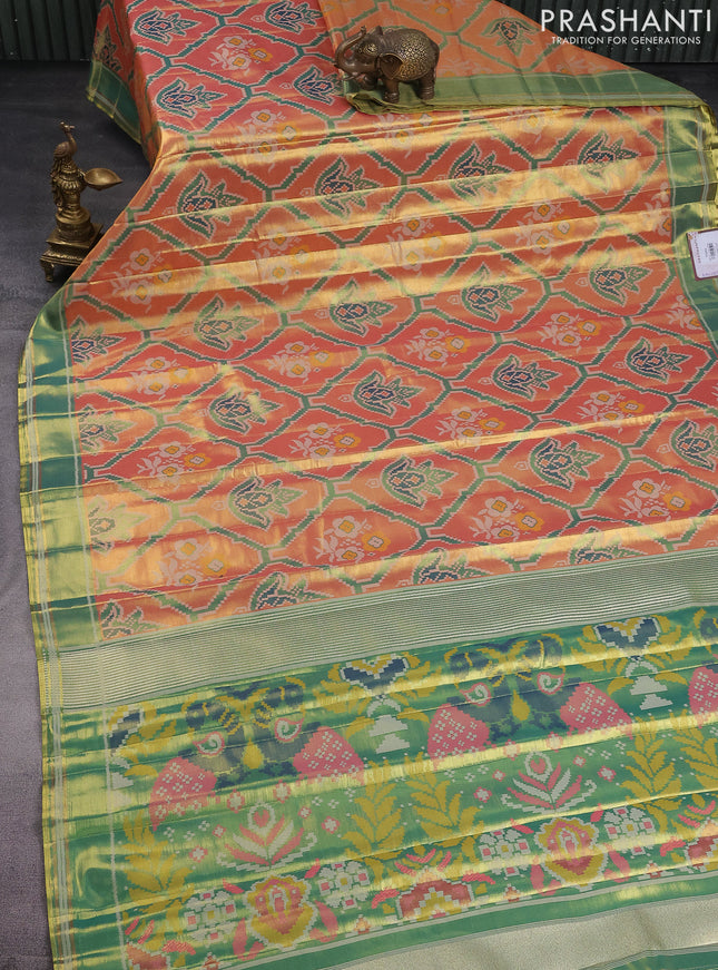 Tissue paithani saree dual shade of peach pink and teal green with allover ikat thread weaves and rettapet border