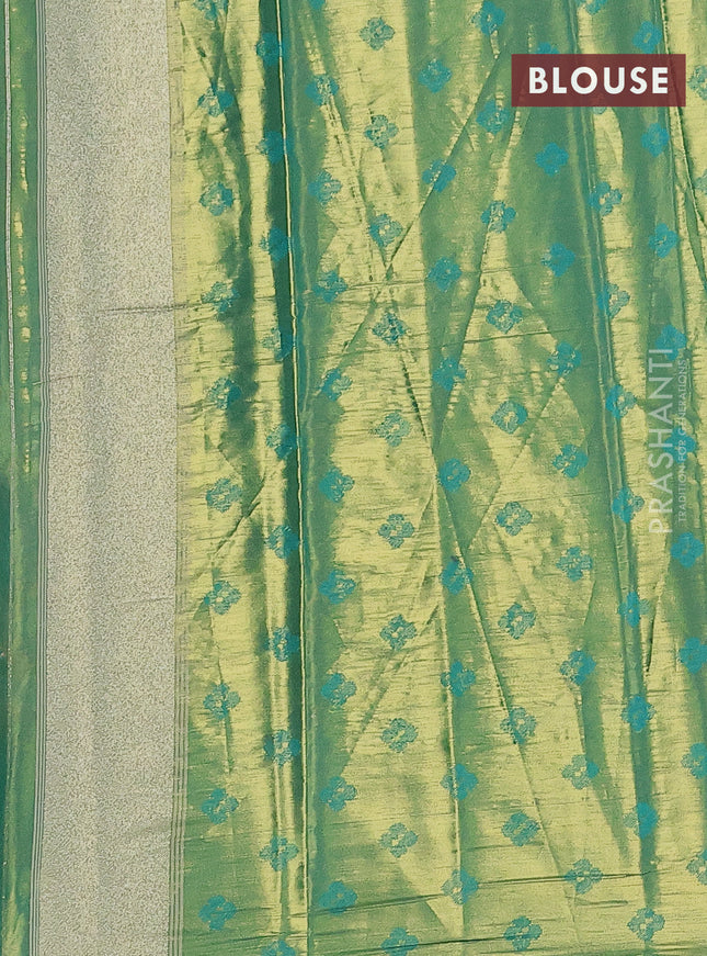Tissue paithani saree dual shade of peach pink and teal green with allover ikat thread weaves and rettapet border