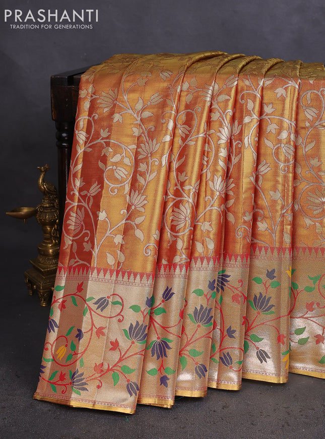 Tissue paithani saree dual shade of gold and rust shade with allover floral zari weaves and zari woven paithani style border