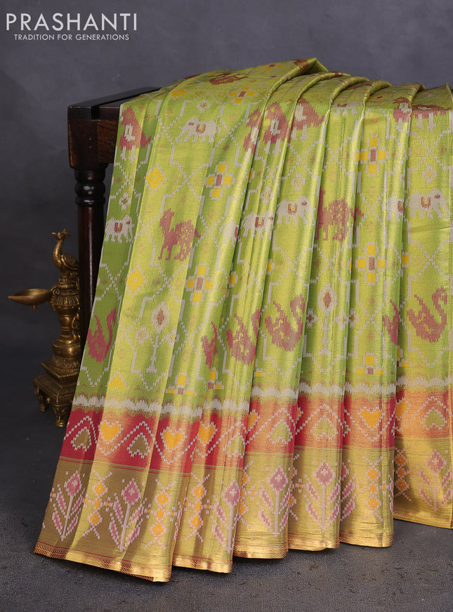 Tissue paithani saree light green and pink with allover ikat thread weaves and paithani style border