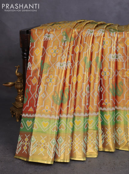 Tissue paithani saree dual shade of goldish maroon and green with allover ikat thread weaves and paithani style border