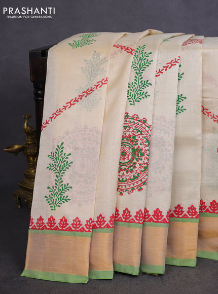 Silk cotton block printed saree cream and light green with allover prints and zari woven border