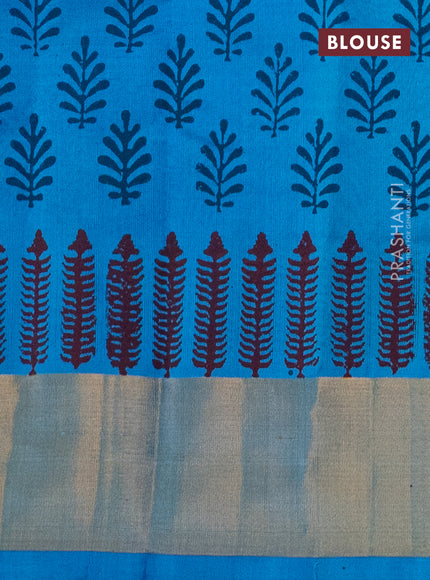 Silk cotton block printed saree light blue with allover prints and zari woven border
