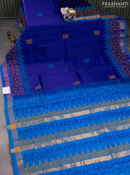 Silk cotton block printed saree blue and cs blue with allover prints and zari woven border