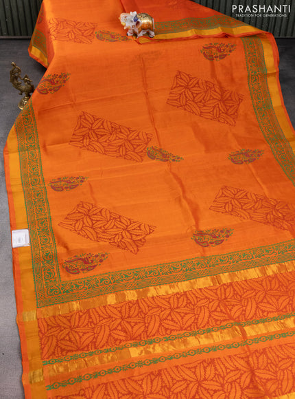 Silk cotton block printed saree orange with butta prints and zari woven border