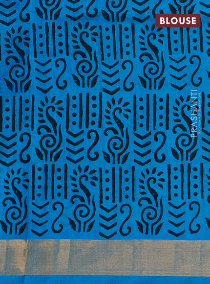 Silk cotton block printed saree light blue with allover prints and zari woven border