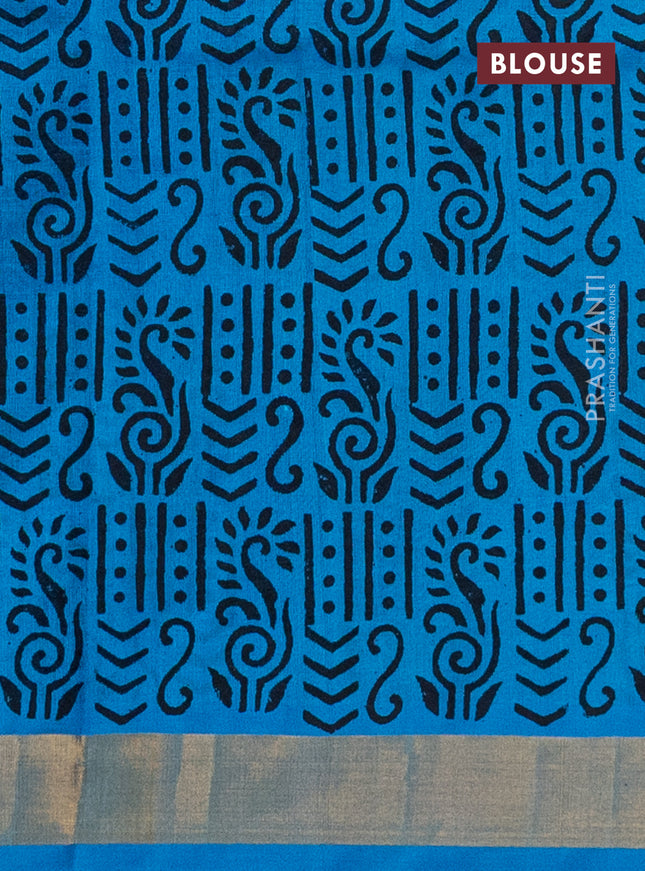 Silk cotton block printed saree light blue with allover prints and zari woven border