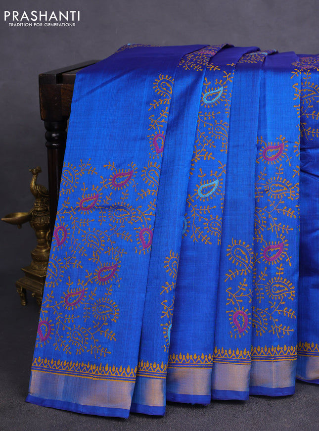 Silk cotton block printed saree cs blue with allover prints and zari woven border