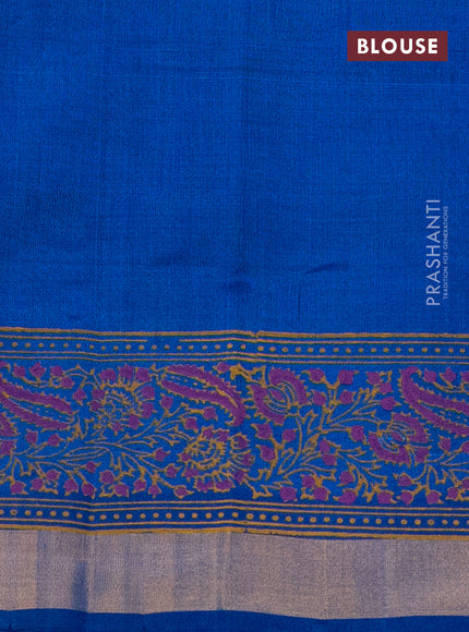 Silk cotton block printed saree cs blue with allover prints and zari woven border