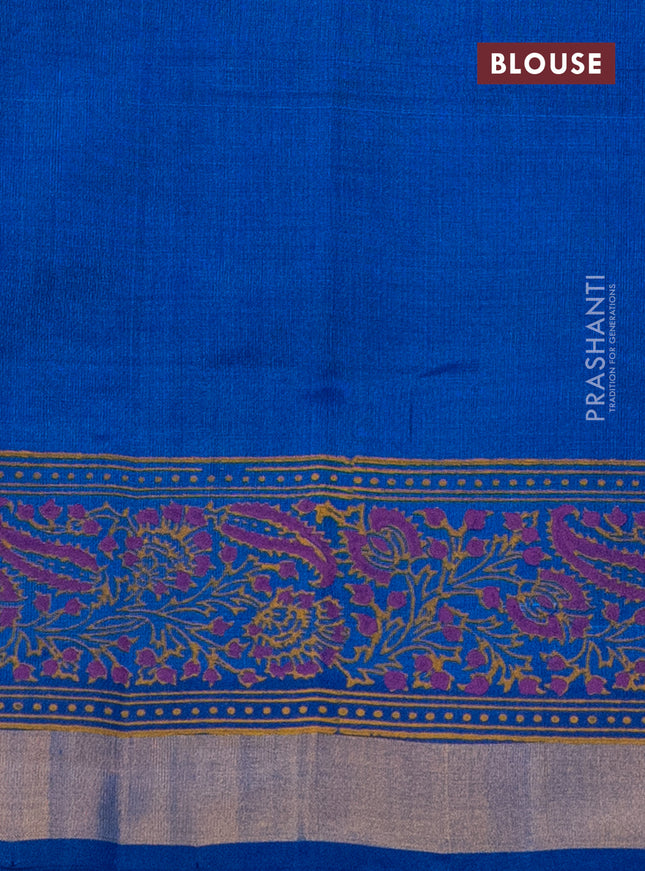 Silk cotton block printed saree cs blue with allover prints and zari woven border