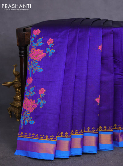 Silk cotton block printed saree blue and cs blue with allover floral prints and zari woven border
