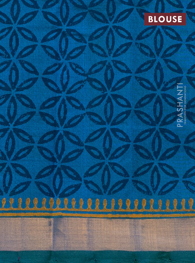Silk cotton block printed saree dual shade of bluish green with butta prints and zari woven border