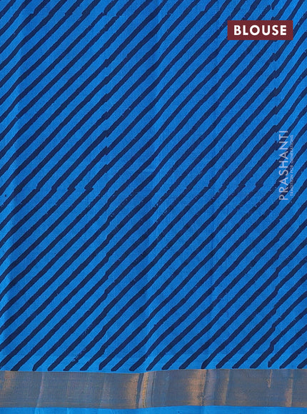 Silk cotton block printed saree cs blue with butta prints and zari woven border