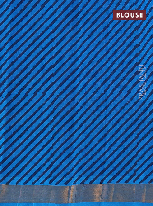 Silk cotton block printed saree cs blue with butta prints and zari woven border