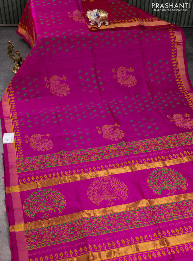Silk cotton block printed saree magenta pink with butta prints and zari woven border