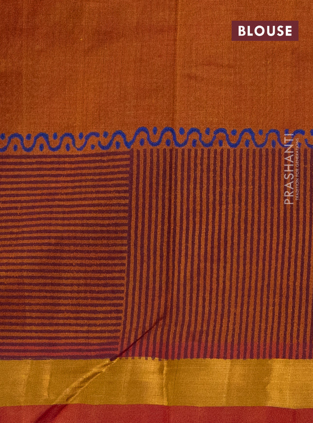Silk cotton block printed saree dual shade of rust with butta prints and zari woven border