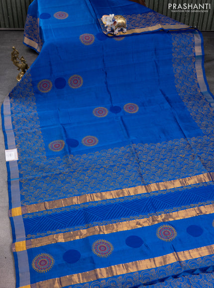 Silk cotton block printed saree cs blue with butta prints and zari woven border