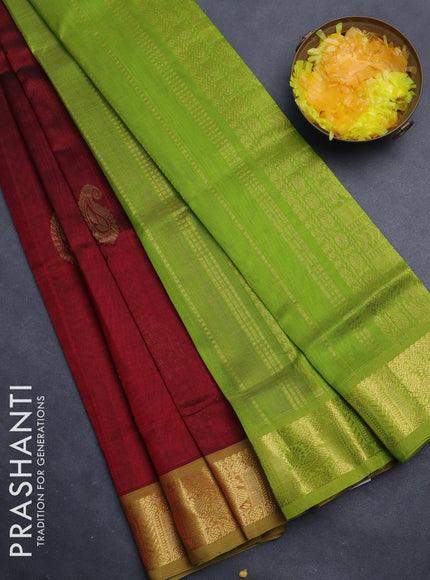 Silk cotton saree maroon and light green with paisley zari woven buttas and zari woven border