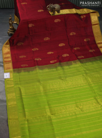 Silk cotton saree maroon and light green with paisley zari woven buttas and zari woven border