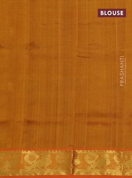 Silk cotton saree dark green and orange with zari woven buttas and annam zari woven border