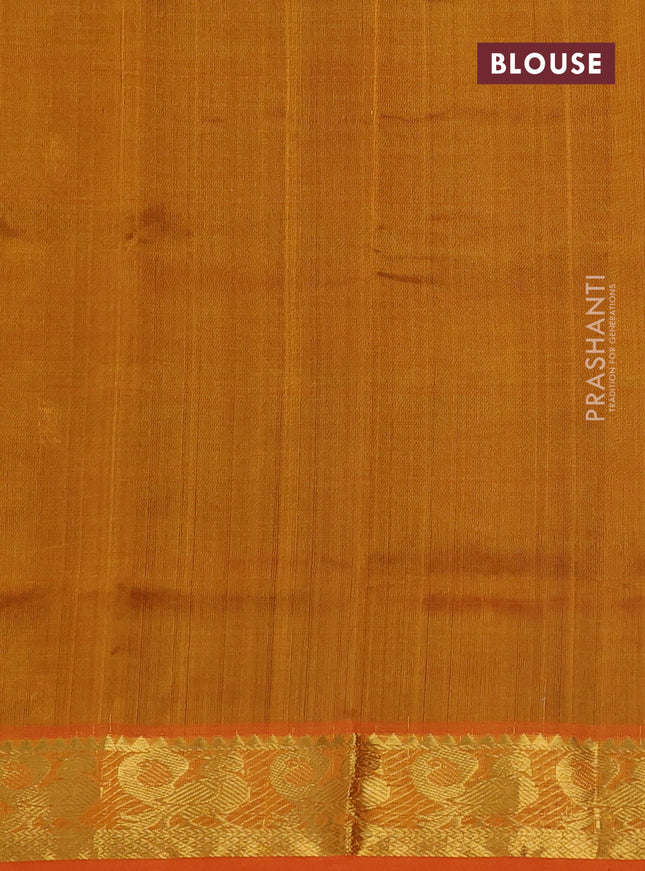 Silk cotton saree dark green and orange with zari woven buttas and annam zari woven border