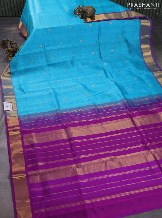 Silk cotton saree light blue and purple with zari woven buttas and zari woven border