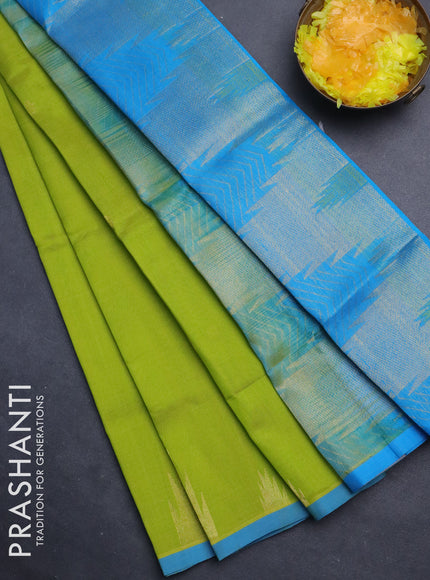 Silk cotton saree light green and cs blue with zari woven buttas and temple design zari woven border
