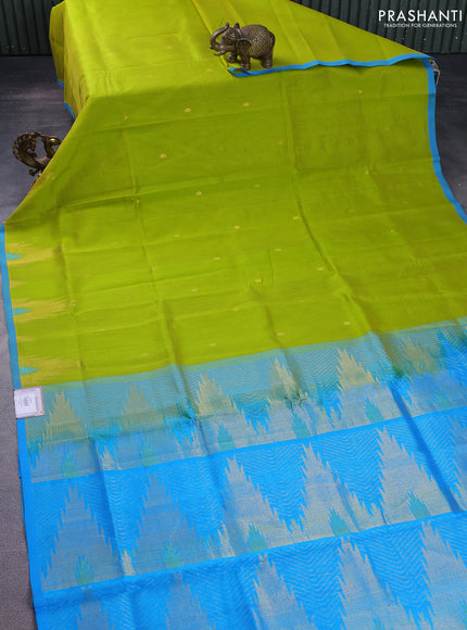 Silk cotton saree light green and cs blue with zari woven buttas and temple design zari woven border