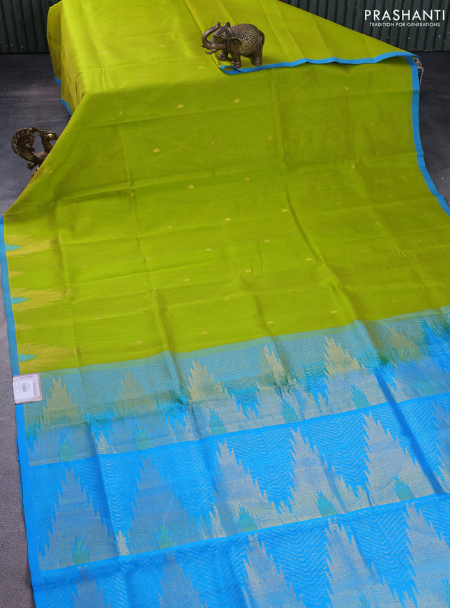 Silk cotton saree light green and cs blue with zari woven buttas and temple design zari woven border
