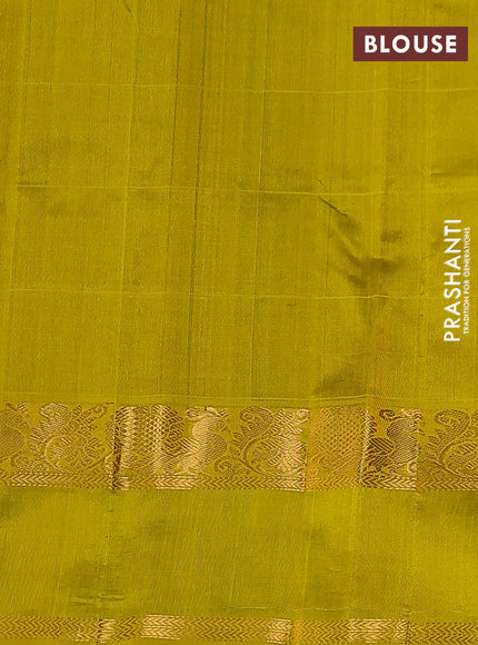 Silk cotton saree green and yellow with checked pattern & buttas and rettapet zari woven border