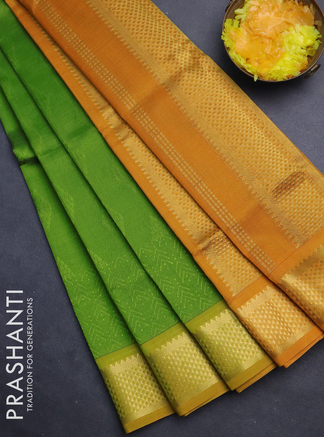 Silk cotton saree light green and mustard yellow with allover self emboss jacquard and zari woven border