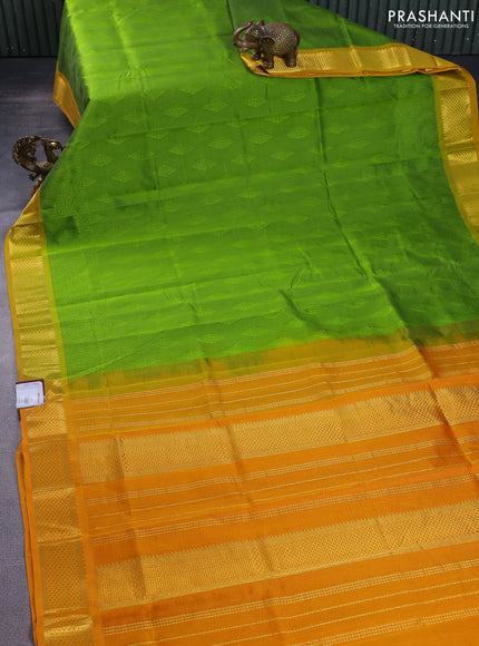 Silk cotton saree light green and mustard yellow with allover self emboss jacquard and zari woven border